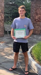 Young man holding certificate